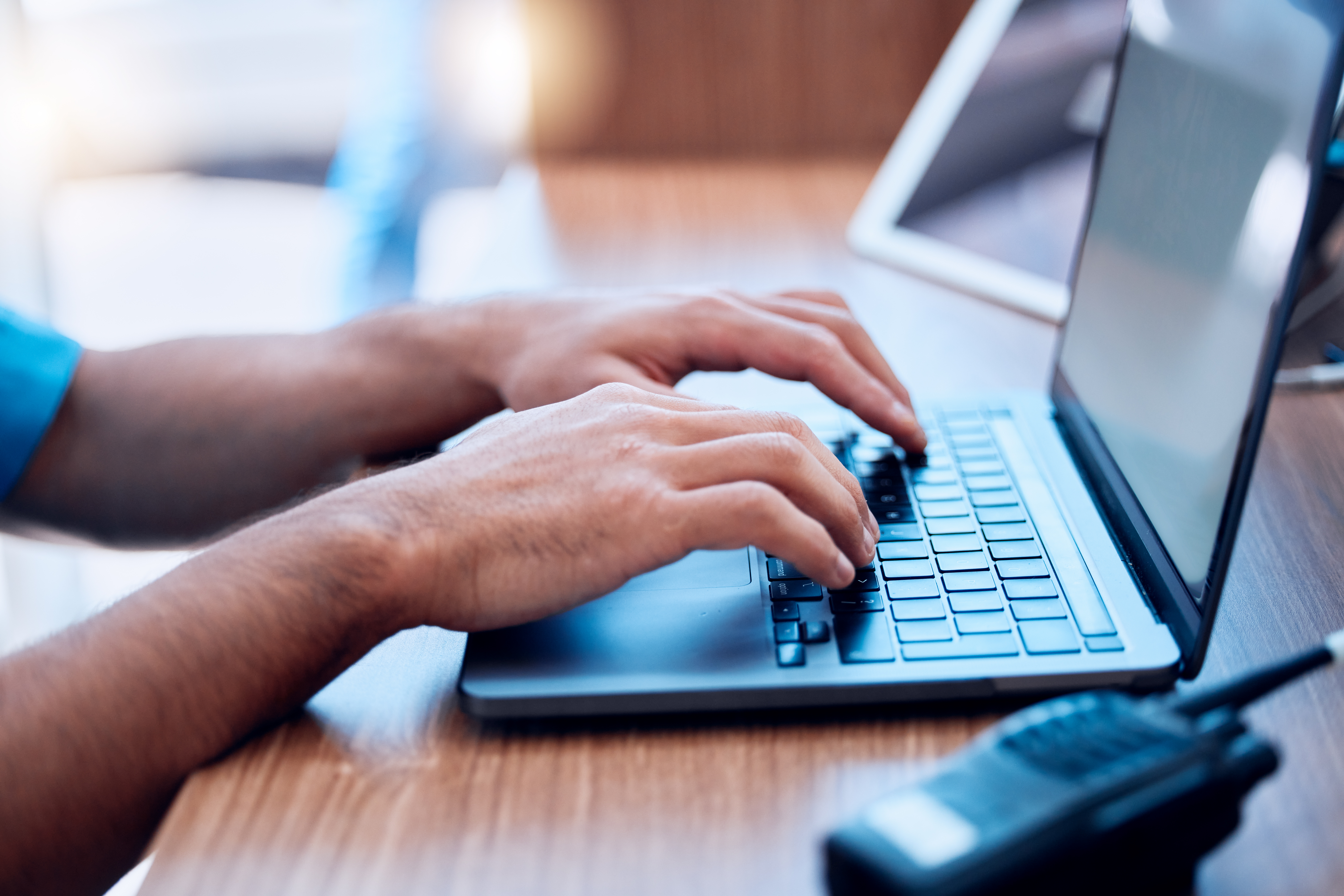person typing on computer