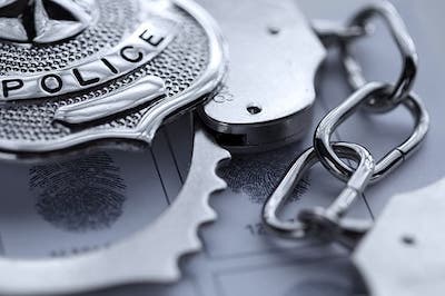 police badge and handcuffs
