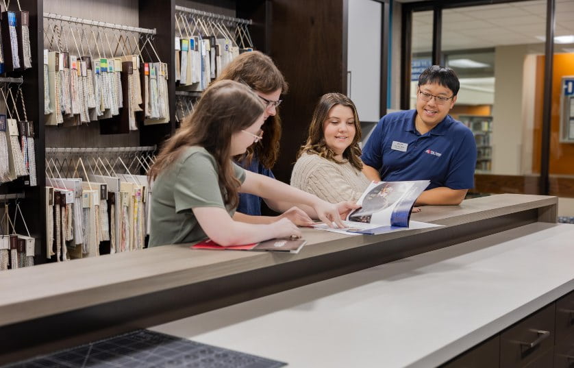 student taking virtual class on laptop