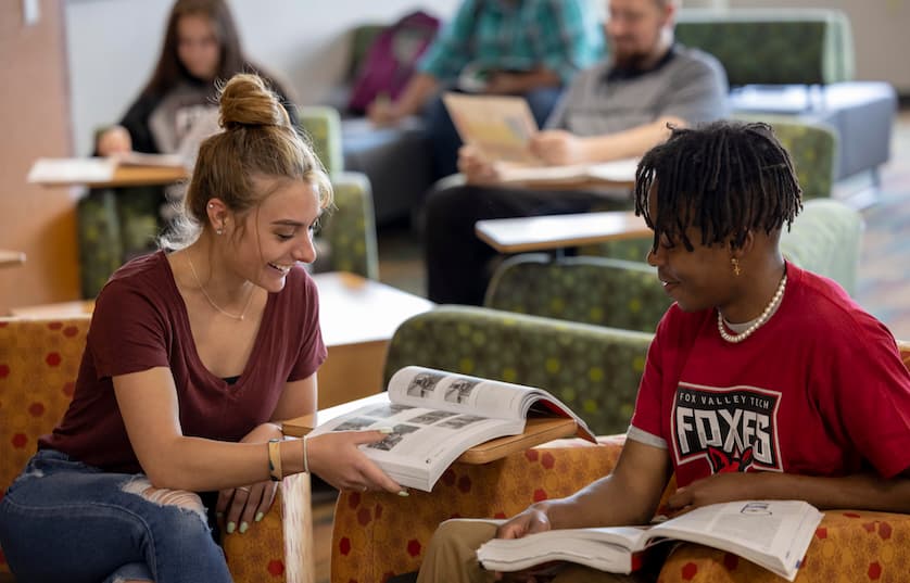 Fox Valley Technical College Students sitting in student success center studying together