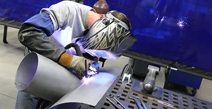 welding student in lab